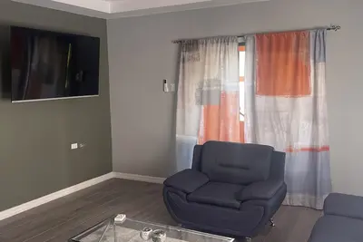Image de The Home Stay:\nCozy 2-bedroom apartment in fantastic La Resource Rd. , D'Abadie.