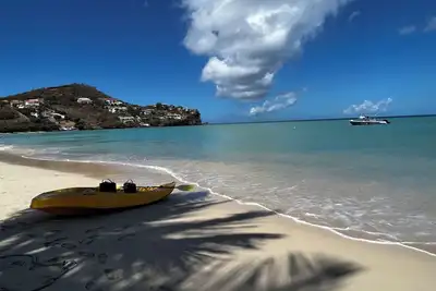 Image de Modern Condo w/ Panoramic Views Walking Distance Between Grand Anse & Bbc Beach