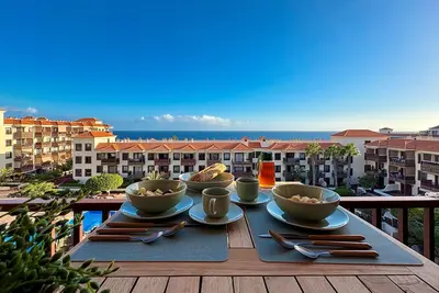 Image de Appartement 'Balcón del Mar - Suite 353' avec terrasse ensoleillée et vue mer panoramique