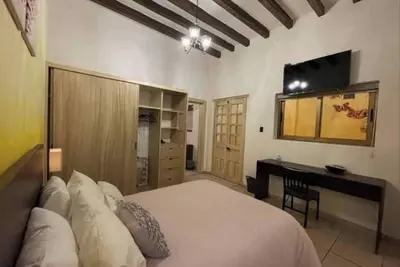 Image de Chambre I pour 4 Personnes 3 Lits