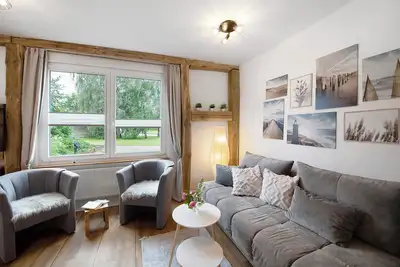 Image de Appartement 'Haus Hinz 2 Zi Fe-Wo An Der Ostsee' avec terrasse partagée, jardin partagé et Wi-Fi