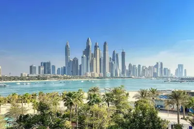 Image de Five Palm Luxury | 2br w/ Pool View, Gym & Prime Beach Stay