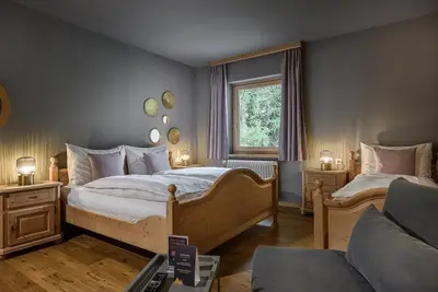 Image de Quadruple room with bath, Wc 2-5n - B&B Berglift