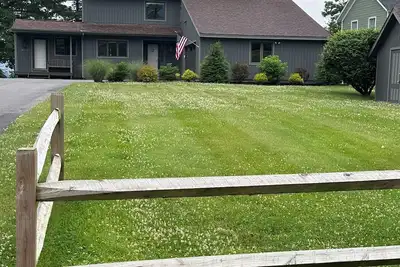 Image de Waterfront home with private dock and sundeck that enjoys spectacular sunsets.