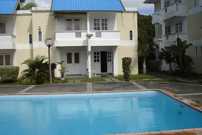 Image de Pereybere 2bedroom apartment with Wifi, Ac, Pool, Parking and Tv premium service