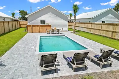Image de Beach-Town Haven | Heated Pool • Walk to Dining and Shops plus Boat Parking