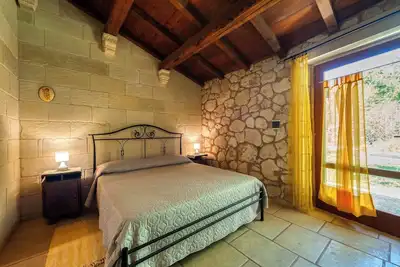 Image de Chambre 'Masseria Copertini - Angelo' avec Wi-Fi et climatisation