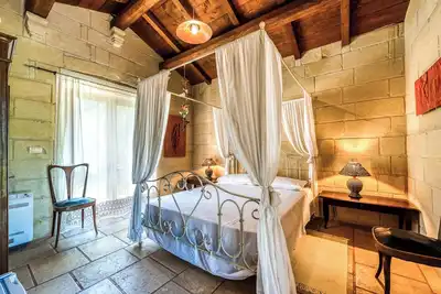 Image de Chambre 'Masseria Copertini - Geco' avec Wi-Fi et climatisation