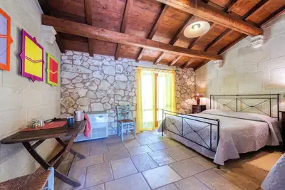 Image de Chambre 'Masseria Copertini - Cervo' avec terrasse privée, Wi-Fi et climatisation