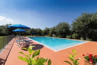 Image de Appartement 'Appartamento In Versilia' avec piscine partagée, Wi-Fi et climatisation
