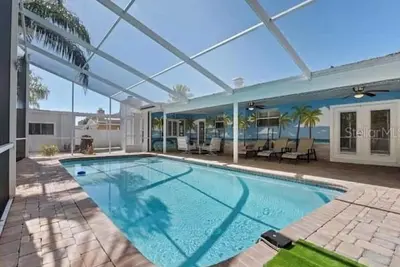 Image de Tropical Oasis with Private Pool & Modern Comforts – Minutes to Beach!