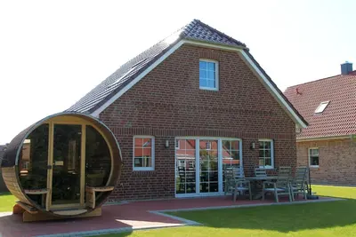 Image de Framheim - 100qm Luxus-ferienhaus für 7 Personen Direkt am Wasser bei Greetsiel!