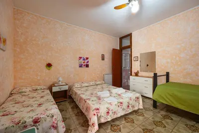 Image de Chambre 'Appartamento 1 - Stanza 12' avec Terrasse partagée, Wi-Fi et Climatisation