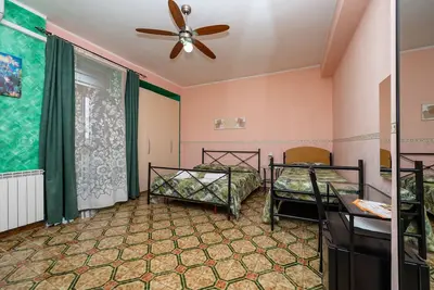 Image de Chambre 'Appartamento 1 - Stanza 13' avec Terrasse partagée, Wi-Fi et Climatisation