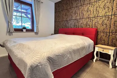 Image de Cozy vacation apartment with garden use, garage and wallbox (extra costs)