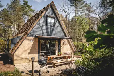 Image de Boshuisje Topo is a cosy 6-person holiday home