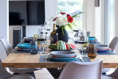 Image de Coastal love! Modern Dhh - with sister house up to 12 persons possible.