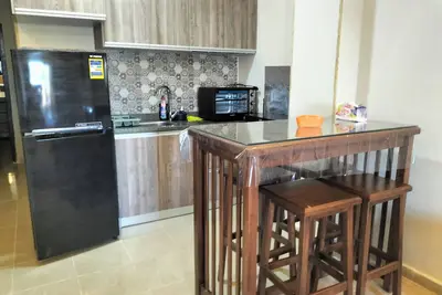 Image de Enjoy Beachfront apartment at elite resort, pool, Wi-Fi, unique location.