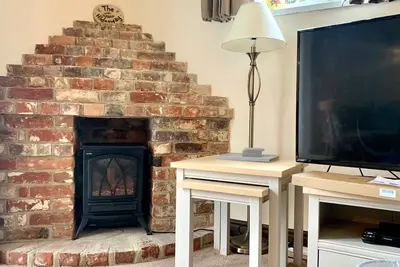 Image de A beautiful, cosy cottage in a peaceful setting with 15% off ferry