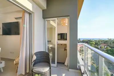 Caribbean Sunset Soak Apt. In the center of town, steps from the Juan Dolio Beach