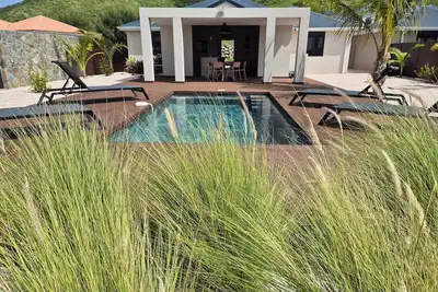 Image de La plus belle vue sur la baie de Pinel, 3 chambres, accès privé à la mer