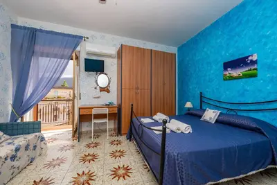 Image de Appartement 'Appartamento 4 - Stanza 43' avec terrasse partagée, Wi-Fi et climatisation