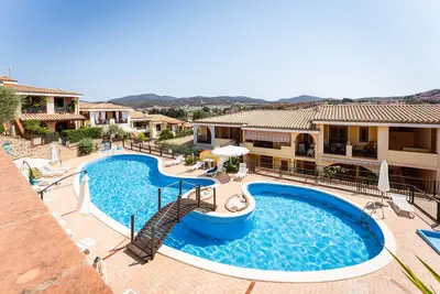 Image de Maison de vacances 'I Girasoli' avec piscine partagée, terrasse privée et jardin partagé