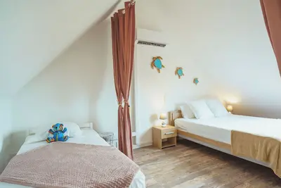 Image de Charmant duplex avec vue mer, piscine et proche de la plage - Le Goyave