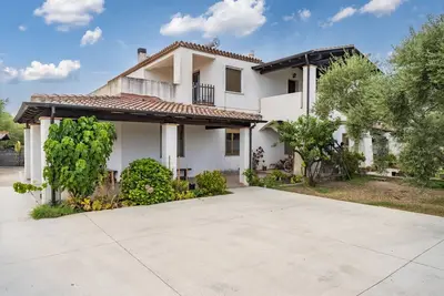 Image de Appartement 'Appartamento Orto Degli Ulivi' avec terrasse privée, jardin privé et Wi-Fi