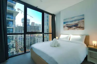 Image de Ultimate Comfort - Modern 3br Apt with Pool and Gym