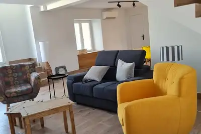 Image de Maison avec terrasse et jardin privée.