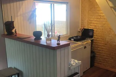 Maison avec jardin clôturé et jacuzzi privé proche spot de surf haapiti