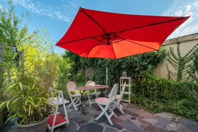Image de Studio 'Dans Maison Proche Gare' avec terrasse partagée, jardin partagé et Wi-Fi