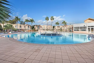 Appartement de vacances 'Villa Maspa' avec piscine partagée, terrasse privée et jardin privé