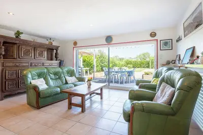 Image de Maison de vacances 'Maison Familiale 800m De La Plage' avec terrasse privée et jardin privé