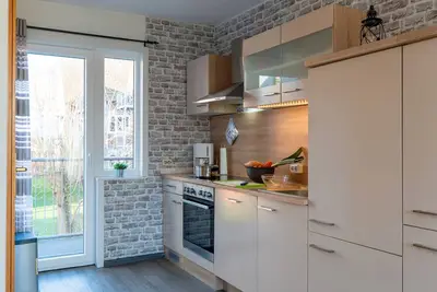 Image de Appartement 'Fewo Krabbe' avec terrasse privée, jardin partagé et Wi-Fi