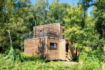 Image de Belvilla Cottage niché dans les bois