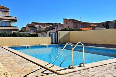 Image de Dans résidence avec piscine