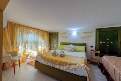 Image de Appartement \"Il Geco - Green\" avec terrasse partagée, Wi-Fi et climatisation