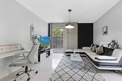 Image de KozyGuru | Ryde | Cosy 2Bed Apt with Private Yard