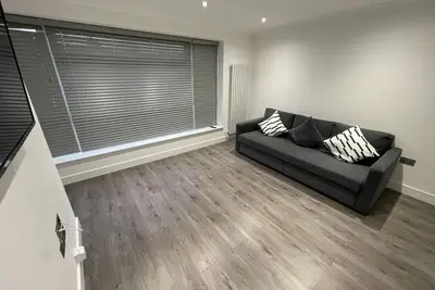 Image de Appartement-Douche-Vue sur Rue-One Bedroom Apartment
