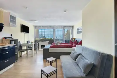 Image de Appartement \"Feuersalamander\" avec vue sur les montagnes, jardin partagé et Wi-Fi