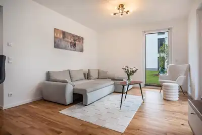 Image de Appartement « Loft moderne avec terrasse privée, jardin commun et Wi-Fi »