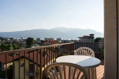 Image de Appartement 'Verbania Panorama Lago' avec vue sur le lac et balcon