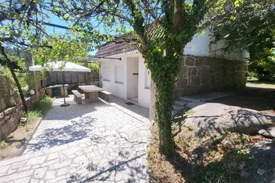 Image de House with swimming pool and private property 15 minutes from Vigo (pet friendly).
