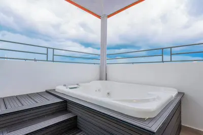 Image de Charming 3-bedroom Penthouse with WiFi and Ac in Santo Domingo