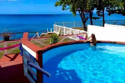 Image de Ocean front 2-bedroom house private Beach, pool in enchanting Rincon wifi Ac