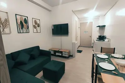 Image de Netflix+ Games+ Cooking+ Karaoke+ Wifi 1 Br Condo in Daily Relax Trees Residence