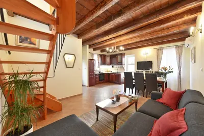 Image de A beautiful rustic house in the center of town, just 30 meters from the beach