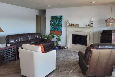 Image de 2 bedroom River front  condo, balcony with open view, fireplace and open space